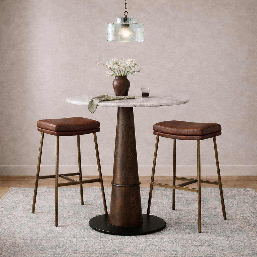 Maven Lane Berkley Backless Bar Stool 31 Inch – Saddle Stool with Footrest – Aged Gold Metal Frame & Brown Faux Leather Upholstery – Ideal for Bars, Pubs and Tall Kitchen Counters