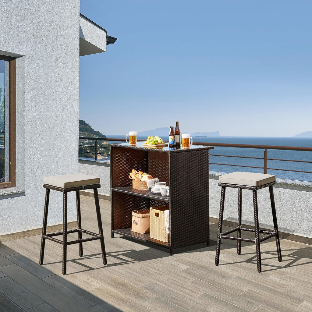 Yaheetech 3pcs Outdoor Bar Set, Patio Wicker Bar Furniture with 2 Storage Shelves, Glass Top Table, Cushions and Two Stools, Brown/Khaki