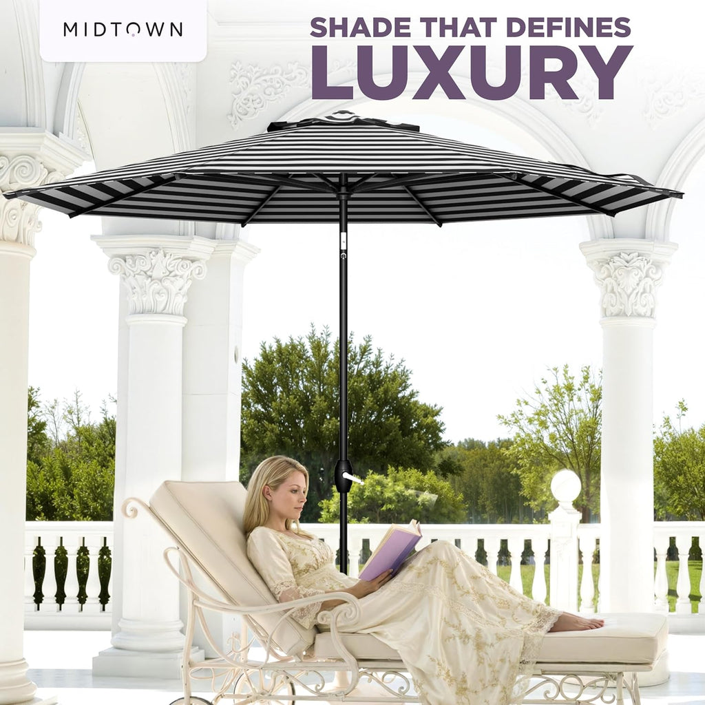 Midtown Umbrellas - The Lean 9 Ft Patio Umbrella with Fade-Resistant Sunbrella Fabric, Auto-Tilt Aluminum Frame and 8 Reinforced Ribs for Deck, Pool & Garden - Black & White Canopy, Black Pole